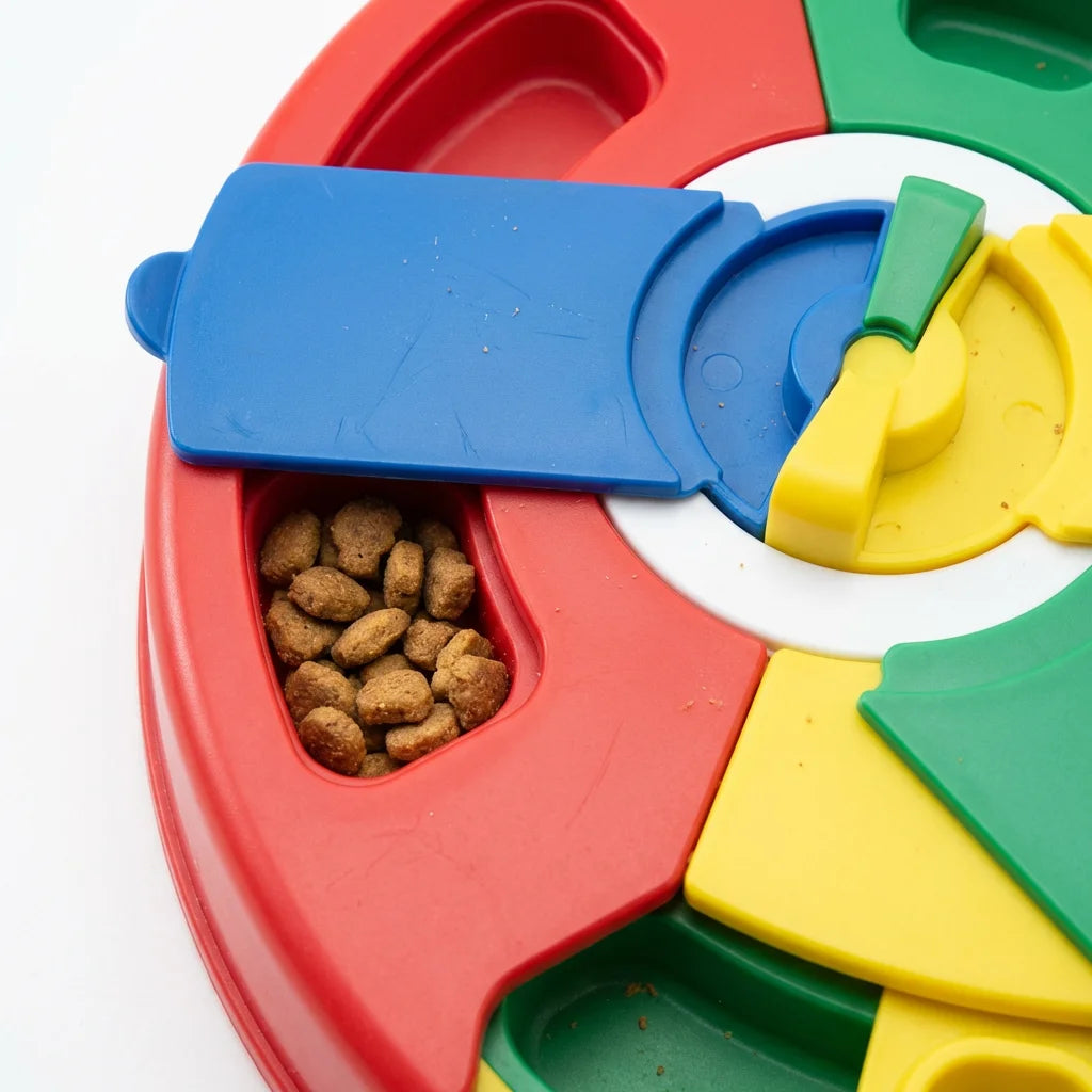 Close-up of sliding compartments with treats